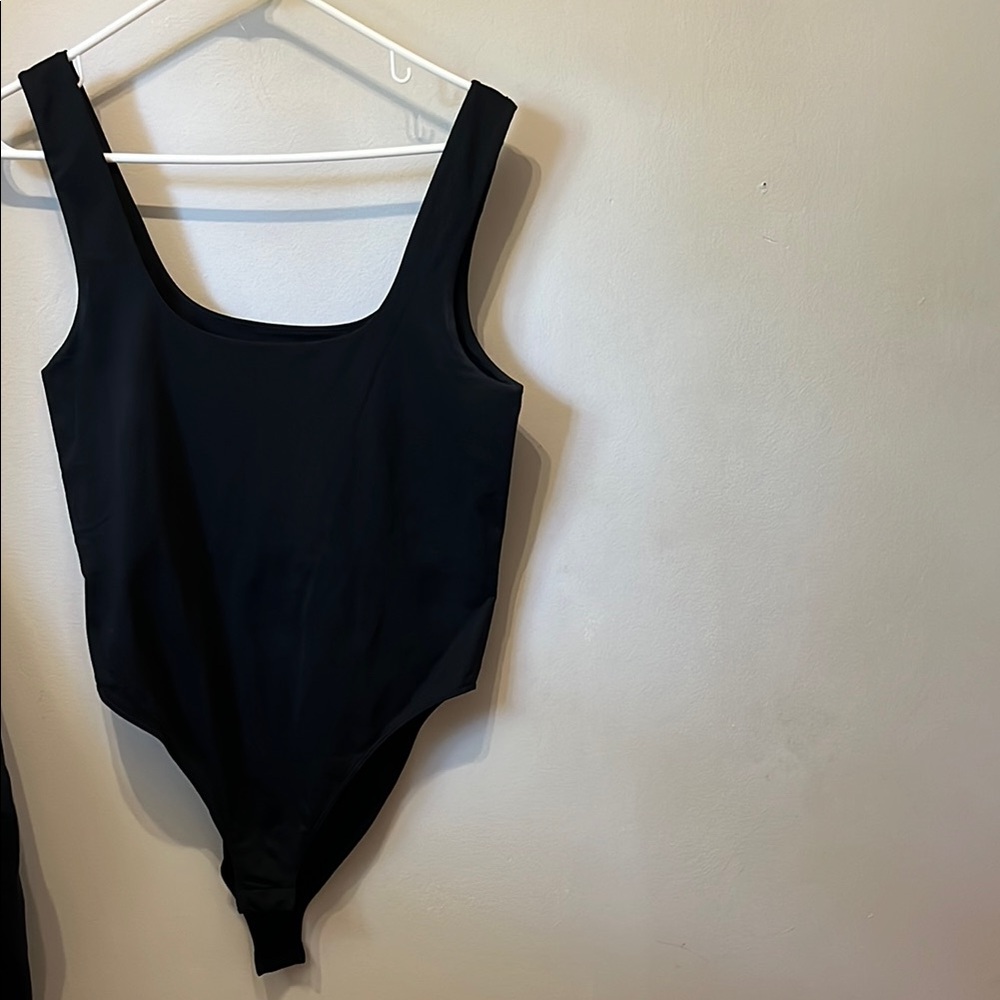 A new day black bodysuit